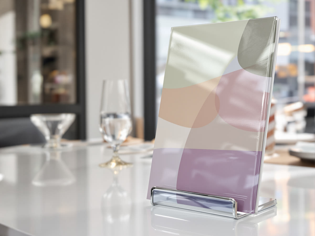 Laminated menu card showing a glossy sealed finish